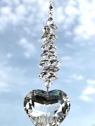 Herz Sonnenfänger in crystal clear mit brillantem Facettenschliff und mit funkelnden Kristallen von Swarovski® in der Kette