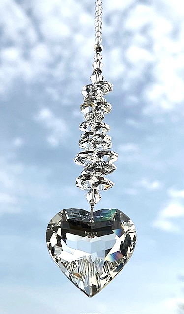 Herz Sonnenfänger in crystal clear mit brillantem Facettenschliff und mit funkelnden Kristallen von Swarovski® in der Kette